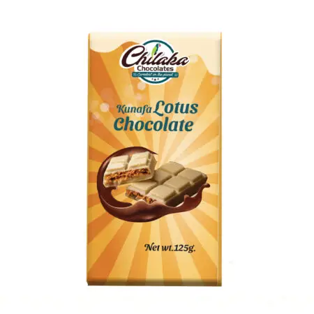 Chilaka Kunafa Lotus Chocolate bar packaging in gold, featuring an illustration of white chocolate squares with a crunchy biscoff-kunafa filling.